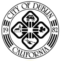 A black and white image of the city seal.